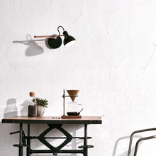Load image into Gallery viewer, Laito Mini Swing Arm Wall Light in living room.

