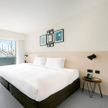 Load image into Gallery viewer, Laito Wall Light in bedroom.
