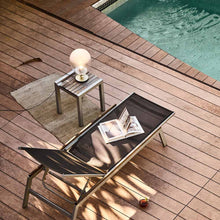Load image into Gallery viewer, Mist LED Table Lamp in Outside Area.

