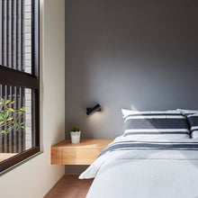 Load image into Gallery viewer, Mumu LED Wall Light in bedroom.
