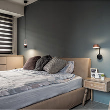 Load image into Gallery viewer, OLO LED Arm Wall Light in bedroom.
