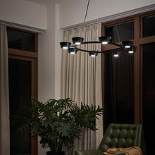 Load image into Gallery viewer, OLO LED Ring Pendant Light in living room.
