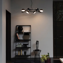 Load image into Gallery viewer, OLO LED Ring Pendant Light in living room.
