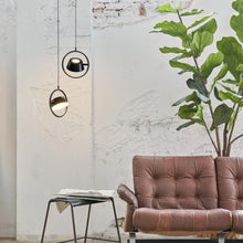 Load image into Gallery viewer, OLO Ring LED Pendant Light in living room.
