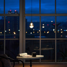 Load image into Gallery viewer, Paopao LED Pendant Light in living room.
