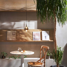 Load image into Gallery viewer, Paopao LED Pendant Light in living room.
