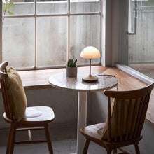 Load image into Gallery viewer, Pensee LED Table Lamp in living room.
