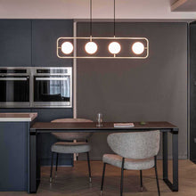 Load image into Gallery viewer, Sircle LED Linear Pendant Light in dining room.
