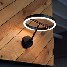 Load image into Gallery viewer, SOL LED Wall Light in living room.
