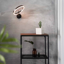 Load image into Gallery viewer, SOL LED Wall Light in living room.

