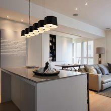 Load image into Gallery viewer, Zhe Linear Pendant Light in living room.
