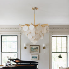 Load image into Gallery viewer, Serenity LED Pendant Light in living room.
