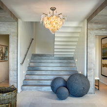 Load image into Gallery viewer, Serenity LED Pendant Light in living room.
