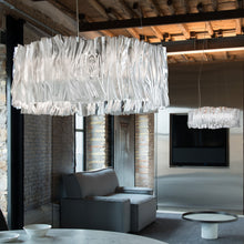 Load image into Gallery viewer, Accordeon LED Chandelier in living room.
