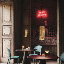 Load image into Gallery viewer, Accordeon LED Pendant Light in restaurant.
