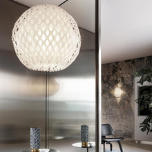 Load image into Gallery viewer, Charlotte Globe LED Pendant Light in living room.
