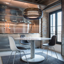 Load image into Gallery viewer, Kalatos LED Pendant Light in living room.
