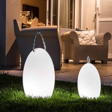 Load image into Gallery viewer, Amanda Corde Bluetooth Outdoor LED Table Lamp in Outside Area.
