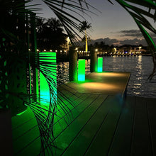 Load image into Gallery viewer, Tower LED Floor Lamp in Outside Area.
