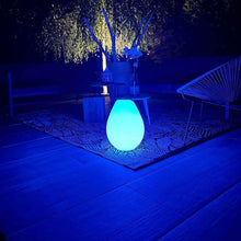 Load image into Gallery viewer, Vessel Bluetooth Outdoor LED Table Lamp in Outside Area.
