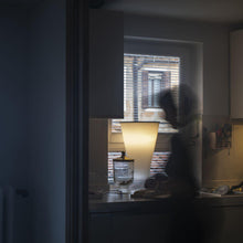 Load image into Gallery viewer, Soffio LED Table Lamp in living room.
