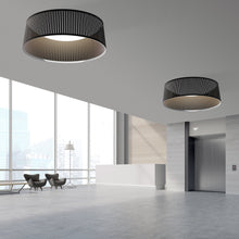 Load image into Gallery viewer, Solis LED Drum Pendant Light in office.
