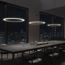 Load image into Gallery viewer, Arctic Rings™ LED Pendant Light in dining room.
