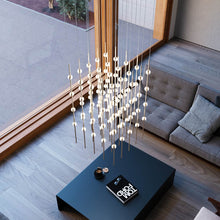 Load image into Gallery viewer, Constellation® Cosmic Cube LED Pendant Light in living room.

