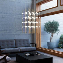 Load image into Gallery viewer, Constellation® Cosmic Cube LED Pendant Light in living room.
