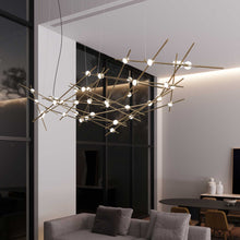 Load image into Gallery viewer, Constellation® Ursa Major LED Pendant Light in living room.
