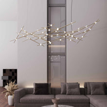 Load image into Gallery viewer, Constellation® Ursa Major LED Pendant Light in living room.
