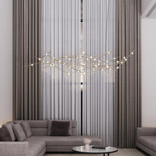 Load image into Gallery viewer, Constellation® Ursa Major LED Pendant Light in living room.

