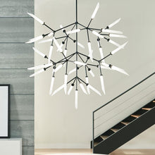 Load image into Gallery viewer, Spur Grande LED Chandelier in exhibition.

