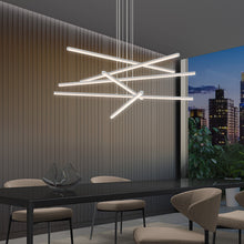 Load image into Gallery viewer, Stix LED Pendant Light in dining room.
