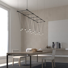 Load image into Gallery viewer, Suspenders® Gridscape LED Pendant Light in dining room.
