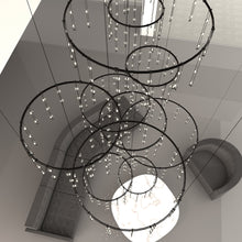 Load image into Gallery viewer, Suspenders® Offset Ring Vertical Matrix LED Suspension Light in living room.
