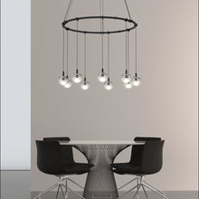 Load image into Gallery viewer, Suspenders® Ring LED Pendant Light in living room.
