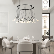 Load image into Gallery viewer, Suspenders® Ring LED Pendant Light in living room.
