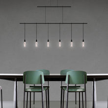 Load image into Gallery viewer, Suspenders® Tier Linear LED Pendant Light in dining room.
