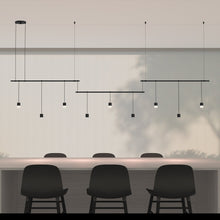 Load image into Gallery viewer, Suspenders®Offset Linear LED Pendant Light in room.
