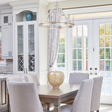 Load image into Gallery viewer, Sutton Chandelier in dining room.
