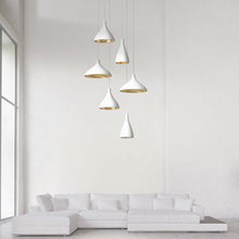 Load image into Gallery viewer, Swell LED String Pendant Light in living room.
