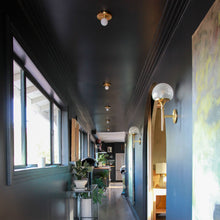 Load image into Gallery viewer, Taft LED Bath Wall Light in living room.
