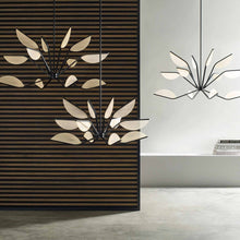 Load image into Gallery viewer, Belterra LED Chandelier in living room.
