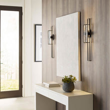 Load image into Gallery viewer, Duelle LED Wall Light in living room.
