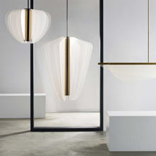 Load image into Gallery viewer, Nyra LED Pendant Light in exhibition.
