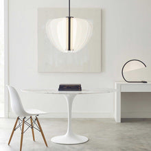 Load image into Gallery viewer, Nyra LED Pendant Light in living room.
