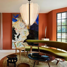 Load image into Gallery viewer, Nyra LED Pendant Light in living room.
