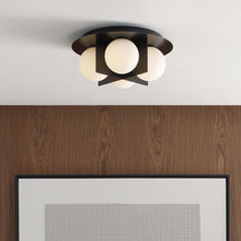 Load image into Gallery viewer, Orbel Flush Mount Ceiling Light in bathroom.
