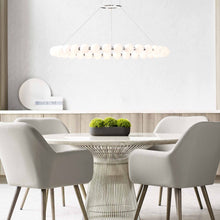Load image into Gallery viewer, Orbet LED Chandelier in dining room.
